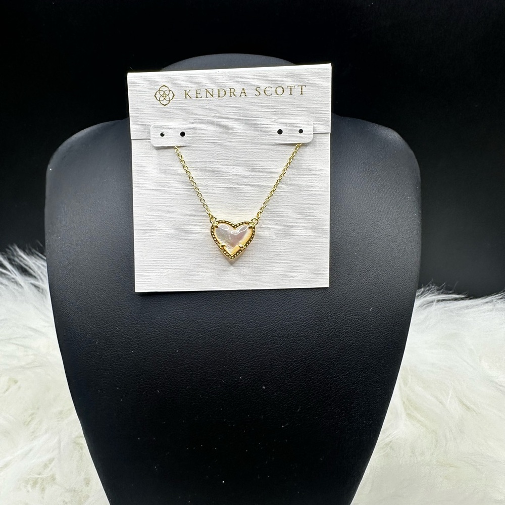 Kendra Scott Gold Heart Necklace with Ivory Mother of Pearl.